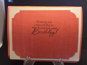 Orange card w doiley inside